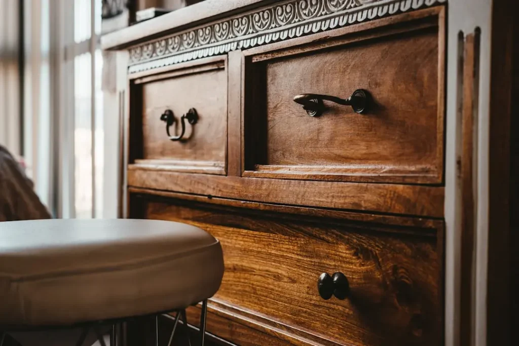 Solid mahogany dresser with carved detail and brass hardware